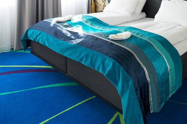 Custom designed Colortec carpets from Dansk Wilton contributes to the Thon Hotel Rosenkrantzs hotel decor that goes all in on colors and exciting experience universes.