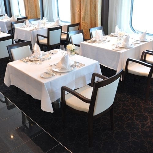 Unique carpet solutions for the restaurant at the cruise ship Seabourn Sojourn, delivered by Dansk Wilton