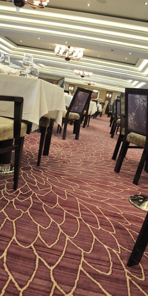 Custom designed carpet solution for Costa Neoromantica hotel, delivered by Dansk Wilton